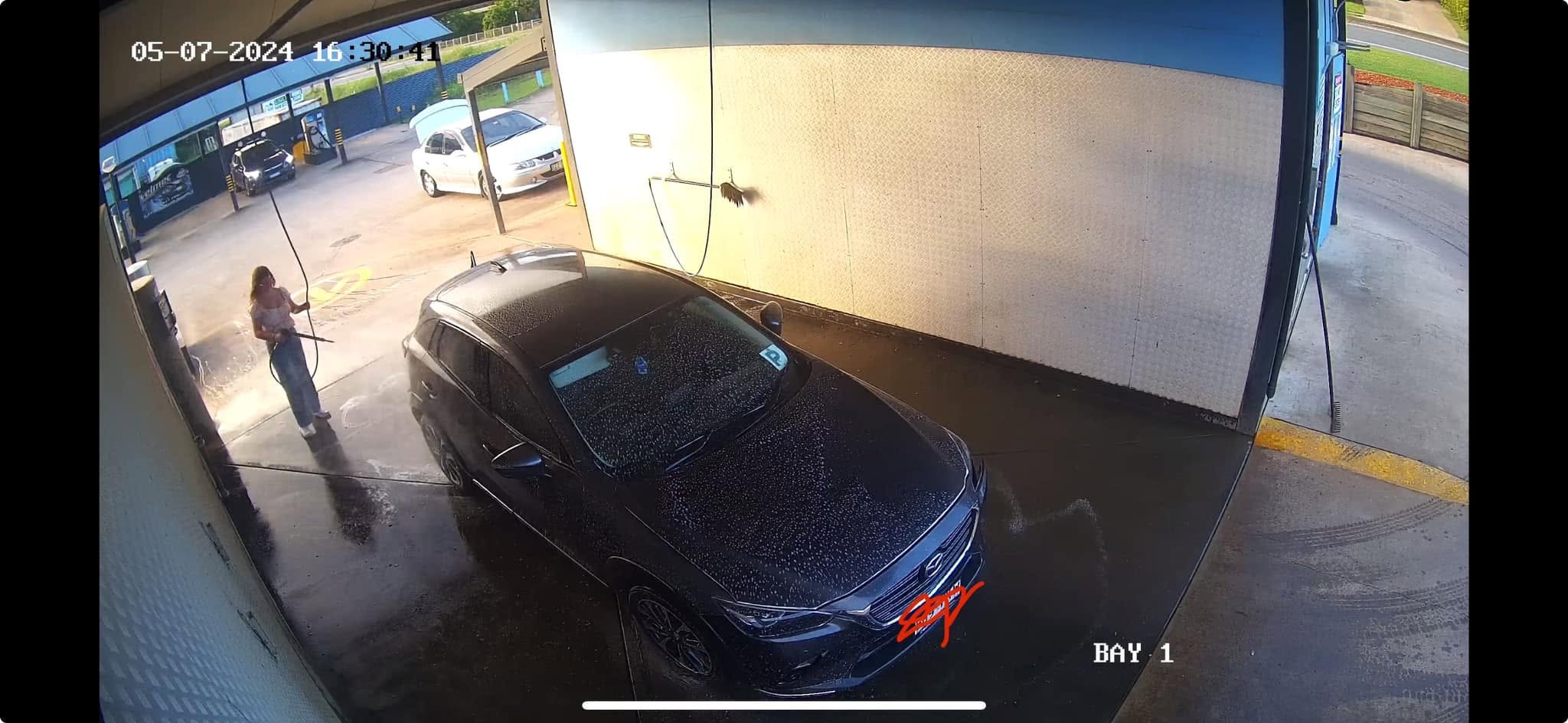 Self-serve wash bay at Scuba's